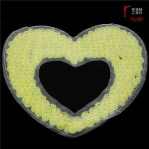 Narancssárga szív alakú flitter javítás