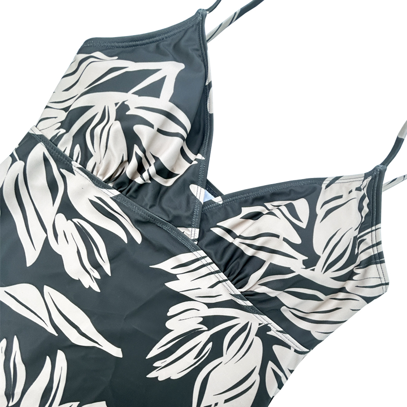 Húzószálú mellény redős V-nyakú zöld levélnyomtatott kétrészes fürdőruhát