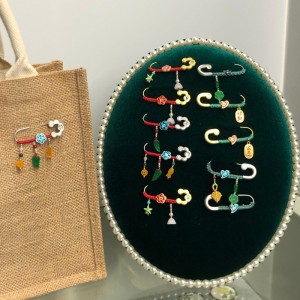 kínai-stílusú szerencsés bross